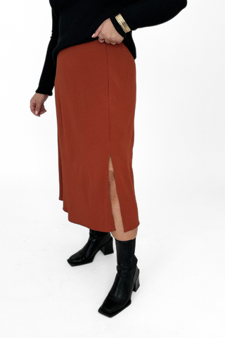 Curve A Line midi skirt in crepe with side split in rust