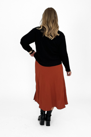 Curve A Line midi skirt in crepe with side split in rust