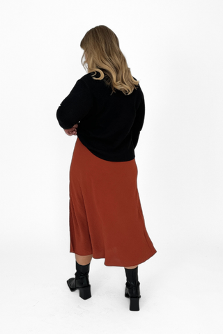 Curve A Line midi skirt in crepe with side split in rust